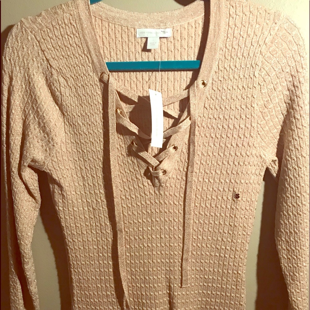 Fitted gold metallic lace up sweater